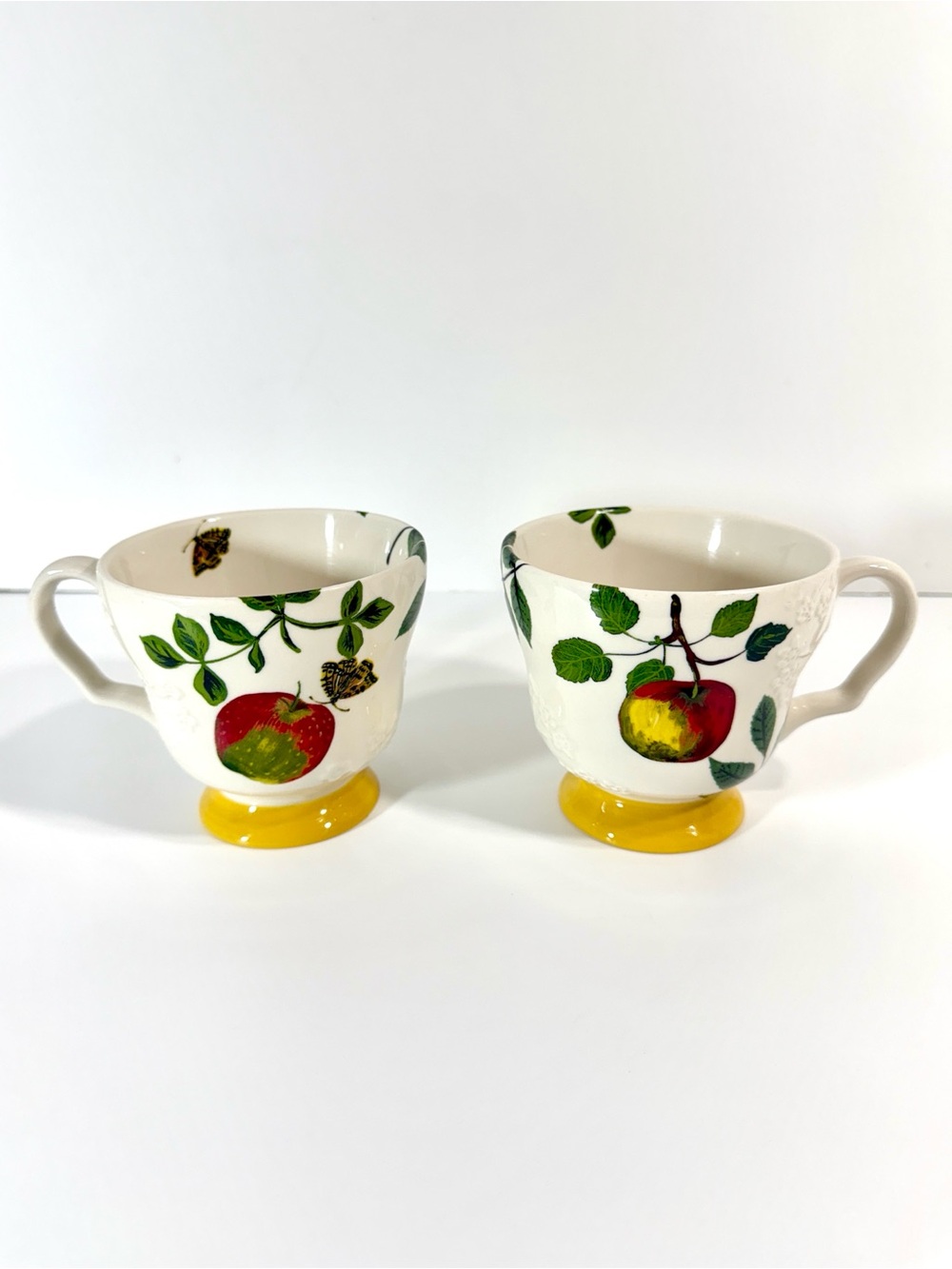 Anthropologie Nathalie Lete Marais Coffee Mug Stoneware Butterfly Apple Set of 2